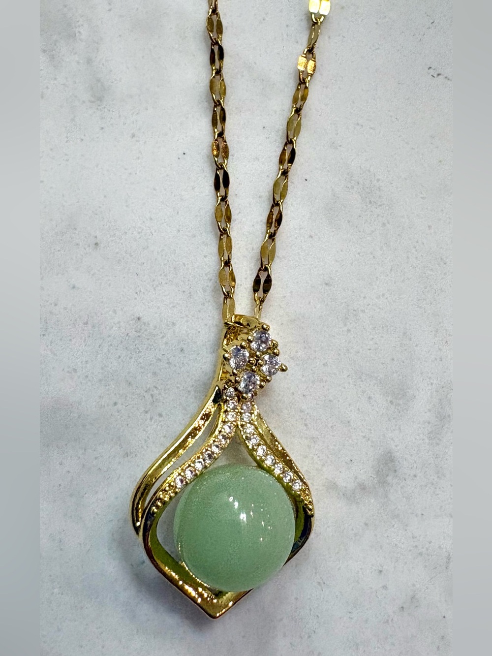Gold Plated Stainless Steel Necklace with Green Spherical Pendant & CZ Accents